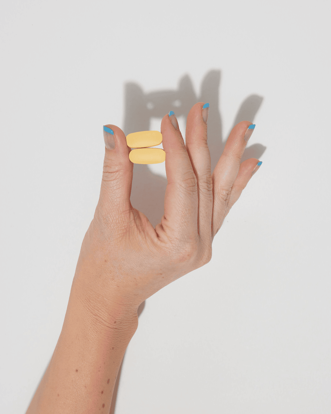 Hand Holding up Show Up Tablets