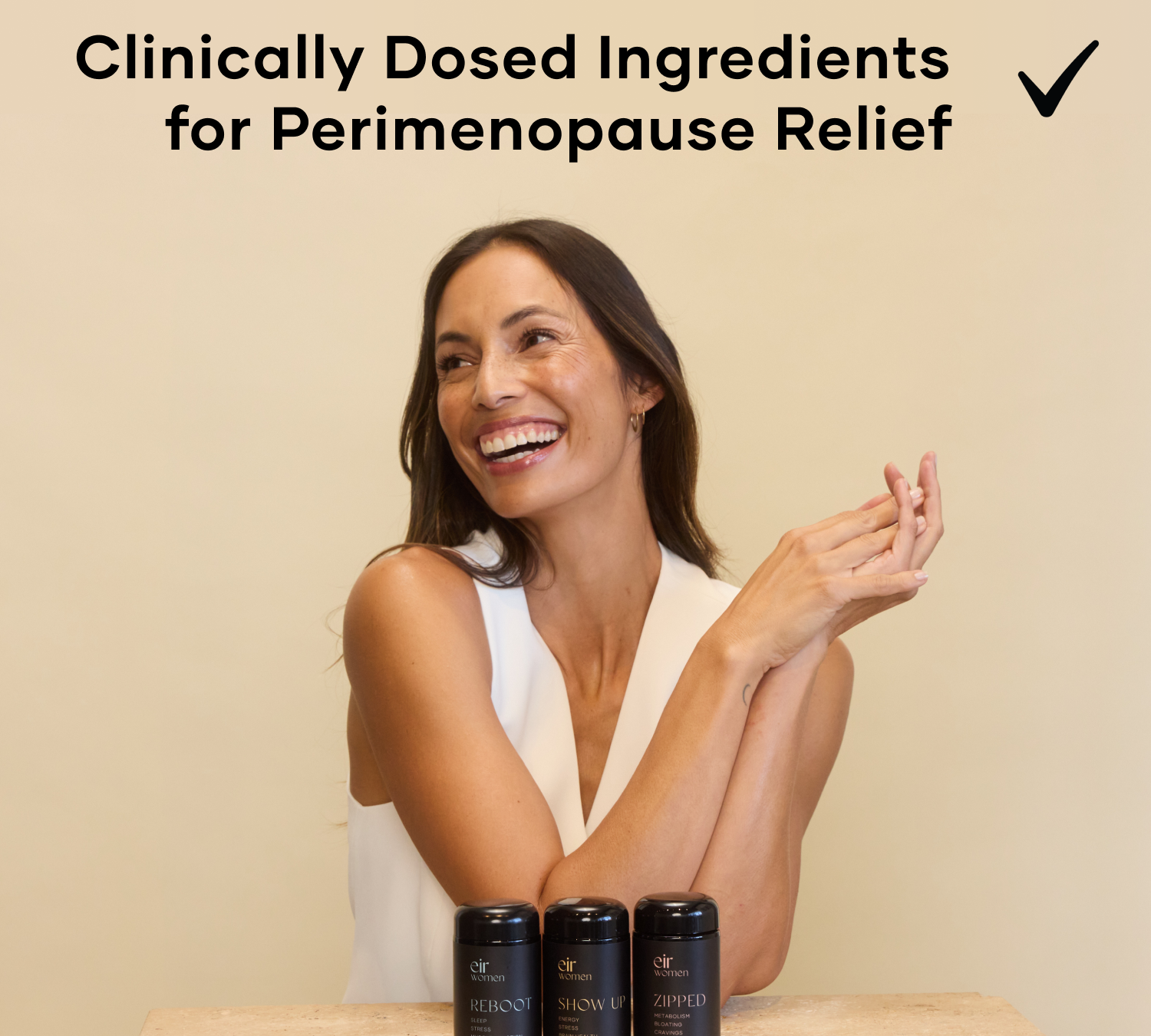 Happy woman with Peri Proof bottles Reboot, Show Up, and Zipped